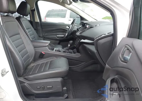 2017 Ford Escape Titanium z USA, uszkodzony, nr VIN 1FMCU9J94HUE48485